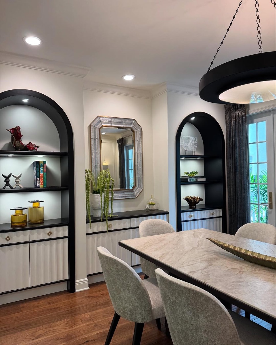 Rio Vista dining room with custom arched built-ins, fluted cabinetry, and sculptural lighting